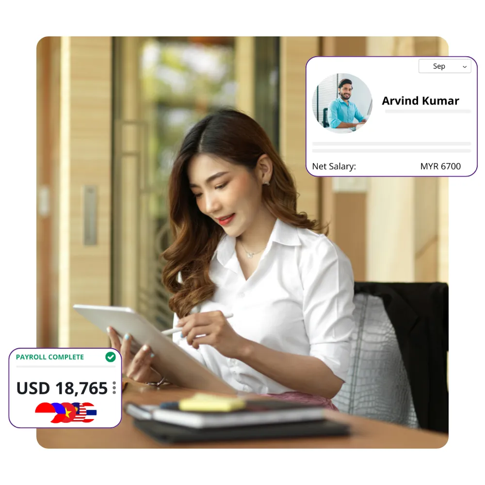A businesswoman working on a tablet in a contemporary office, accompanied by digital payroll information, representing efficient and compliant payroll management solutions.